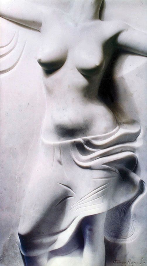 Marble high relief “Breeze”: a white female torso with raised arms, the lower body covered by flowing carved folds of cloth.